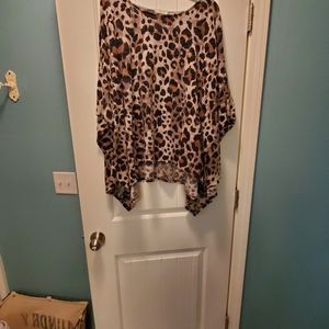 Oversized animal print. Can be worn off one should